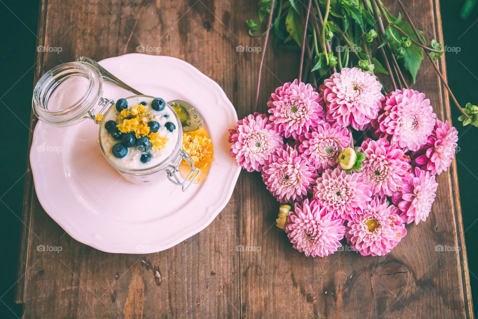 afternoon tea with a bouquet of flowers on the table