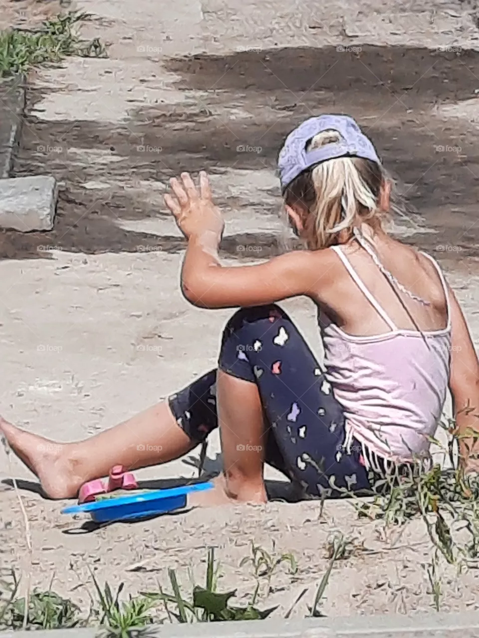 happy kid in sand