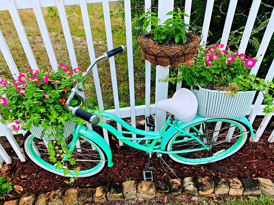 One Lonely Bicycle - There’s just something about a bike decorated with flowers that makes it look right at home. A certain nostalgia we associate with simpler times. 