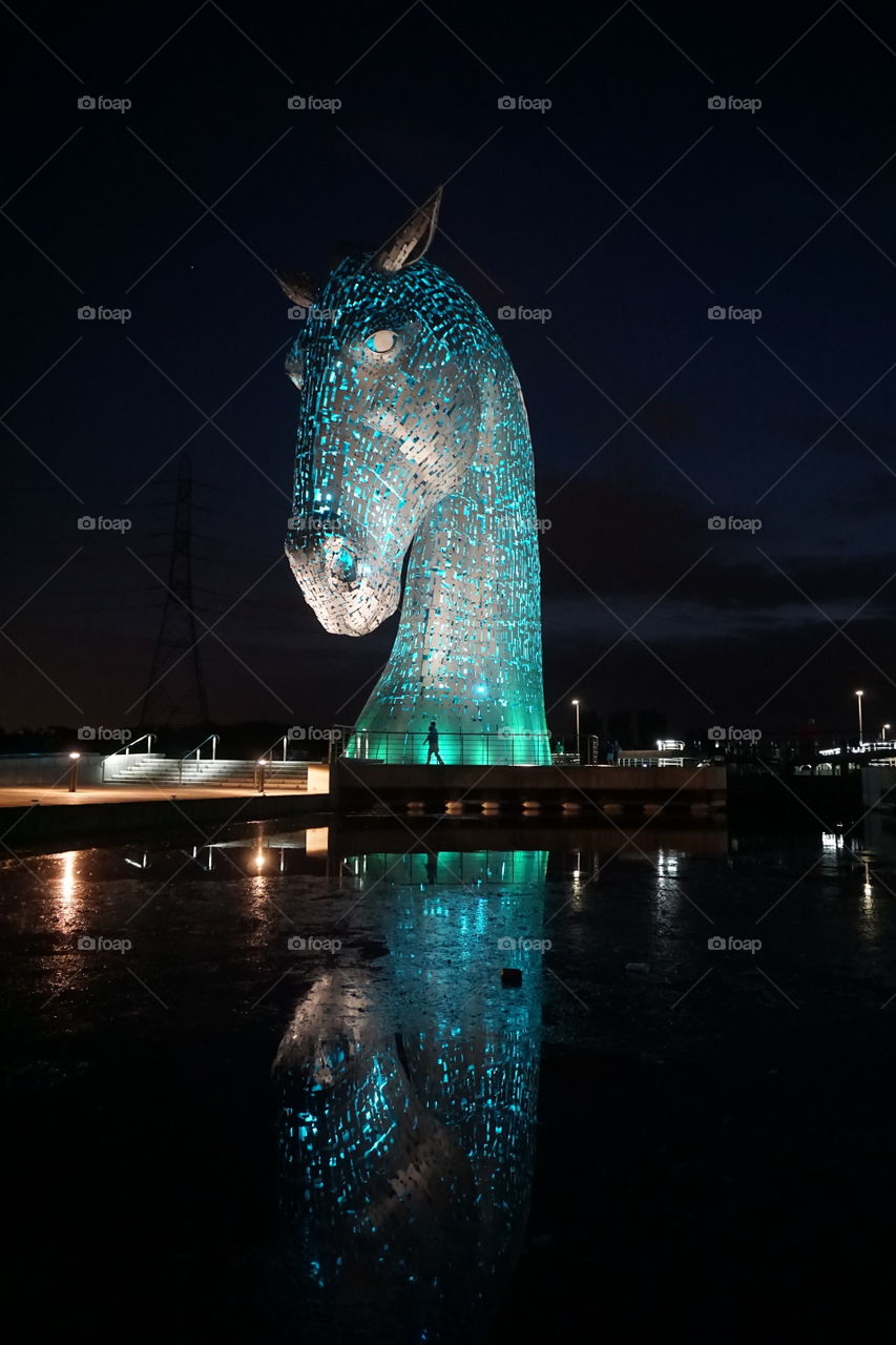 One of The Kelpies lit up blue ... amazing sculptures 