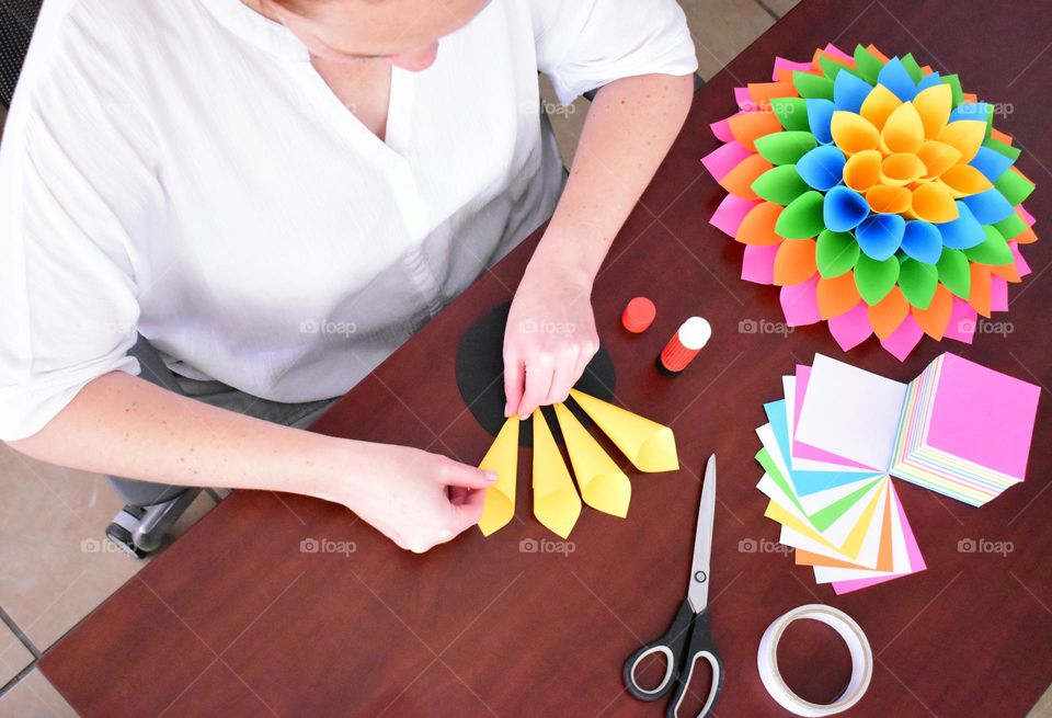 DIY table ,wall and background decorations for a party. Creative with your hands. Handmade crafts with pastels. Doing arts, crafts, hobby and hobbies at home. Creating paper flower flowers and paper dahlia flowers. Making paper wreath dahlia.