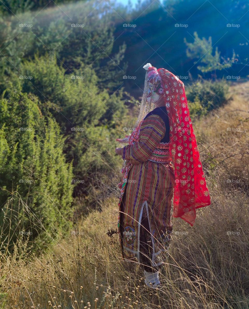 Forest photosession in traditional costume