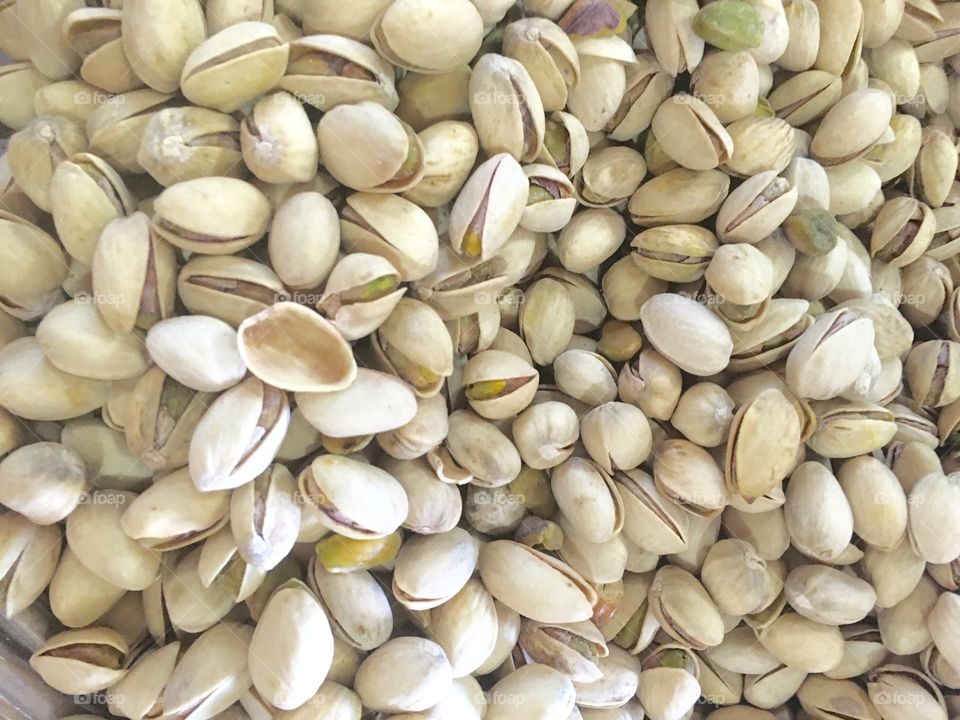 Pistachio nuts many thousands group food delicious