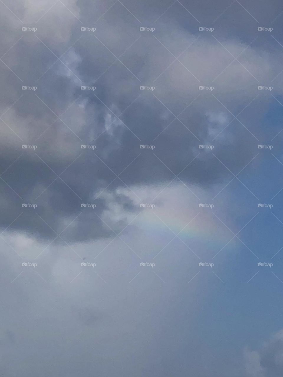 Beautiful rainbow in the storm clouds over the bay where we tried to outrun the storm!