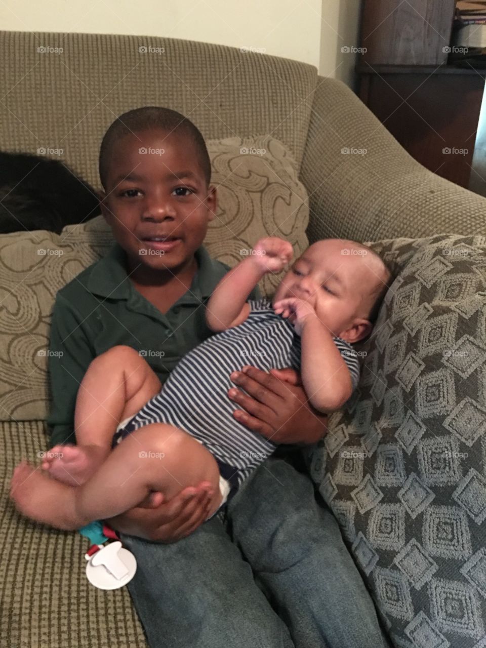 Uncle Corey holds his nephew