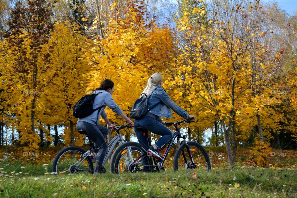 people riding bike beautiful nature landscape