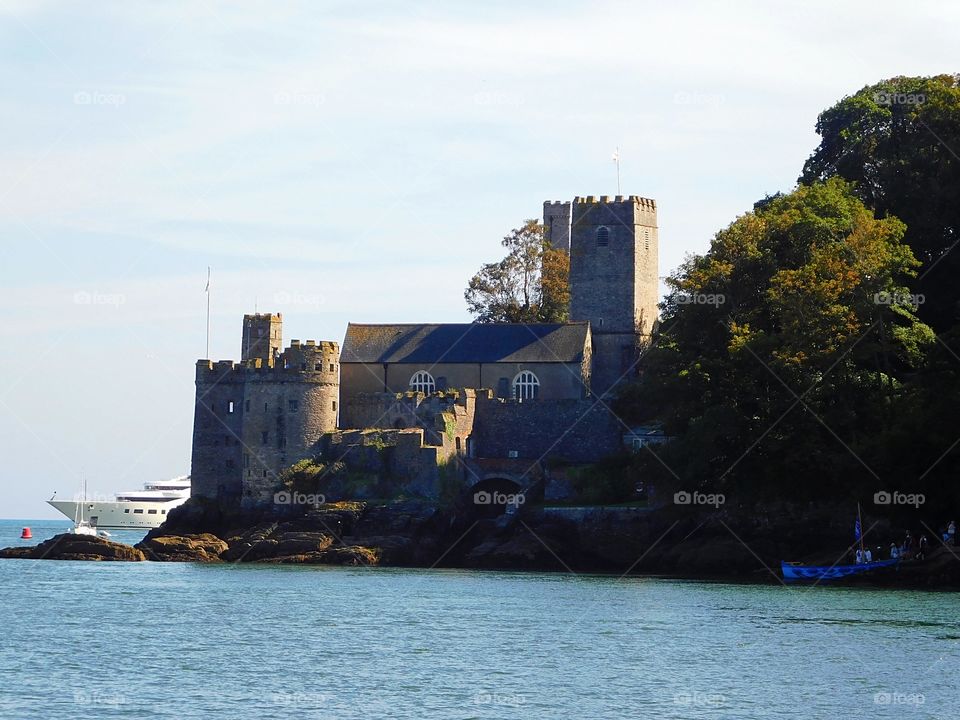 Dartmouth Castle, with Superyacht The Ace in the background