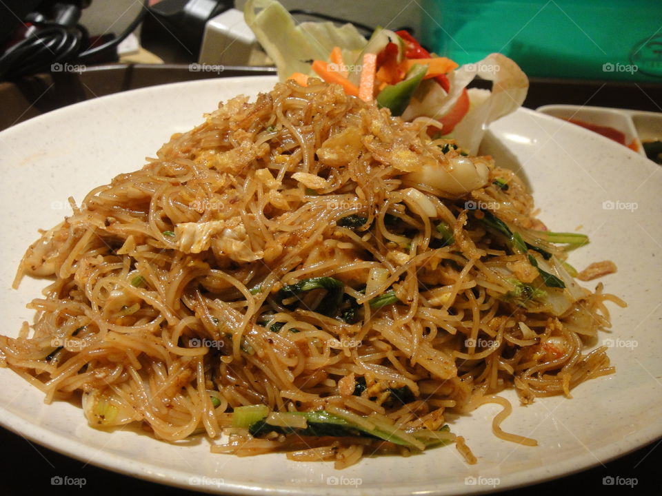rice noodles in thick savory sauce 