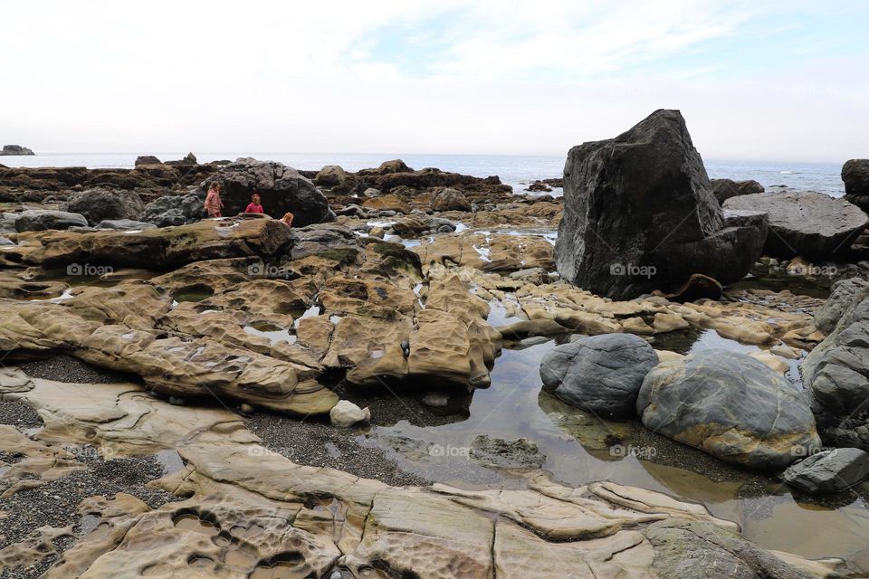 Rocky beach with potholes 