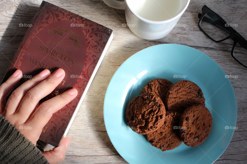 reading morning eating cookie and drinking milk