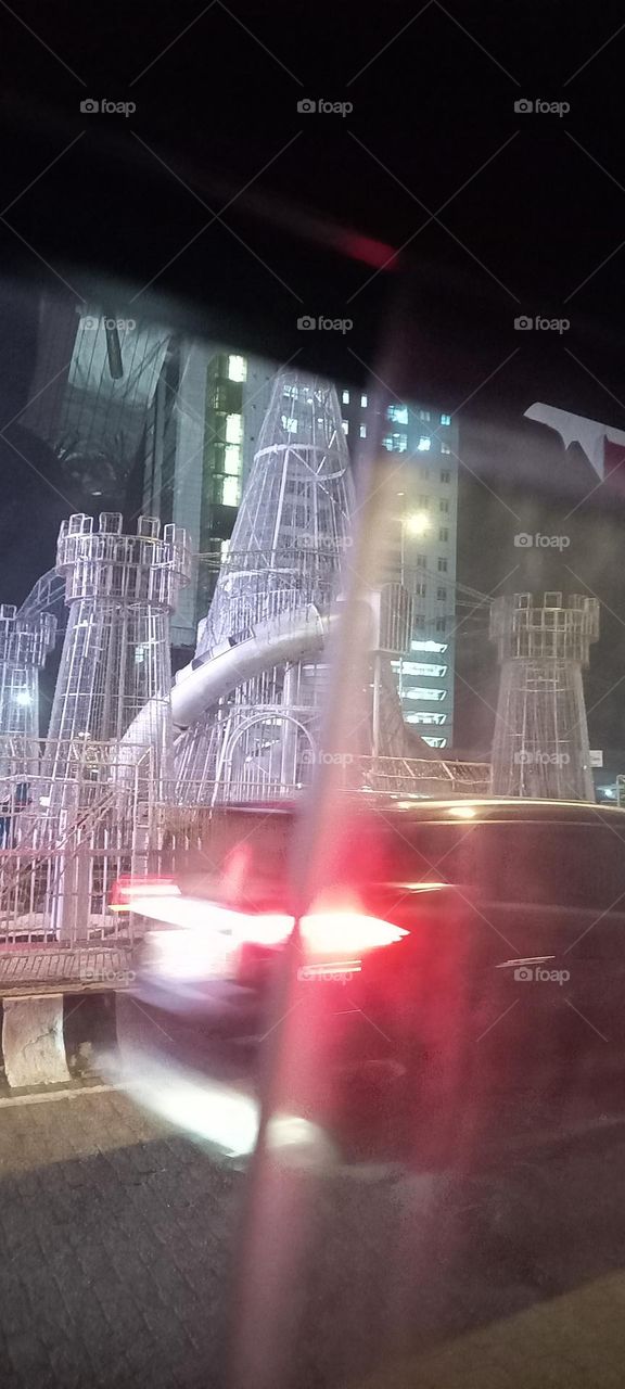 Twinkling windows , the beauty of evening light. Bask in the beauty of evening light with the view of light twinkling from these windows at night