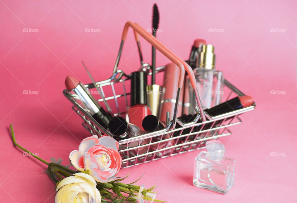 decorative cosmetics in a basket