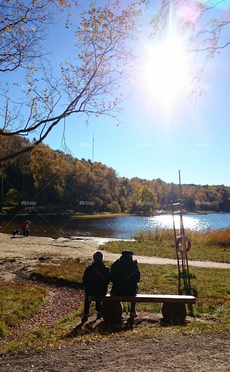 old couple enjoying the fall. old couple enjoying the fall