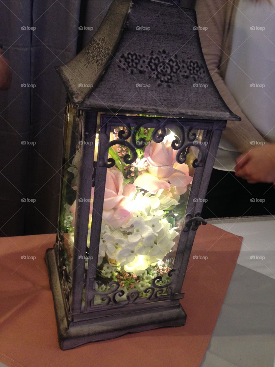 Beautiful lantern with flowers and light centerpiece 