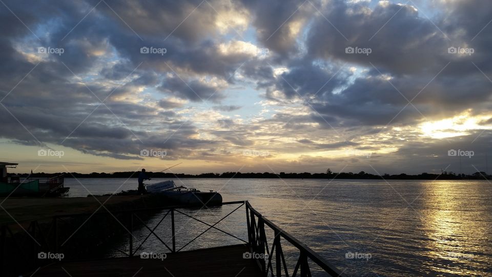 As Daylight Fades. I caught a wondrous sunset on the Guaíba River in Porto Alegre, Brazil.