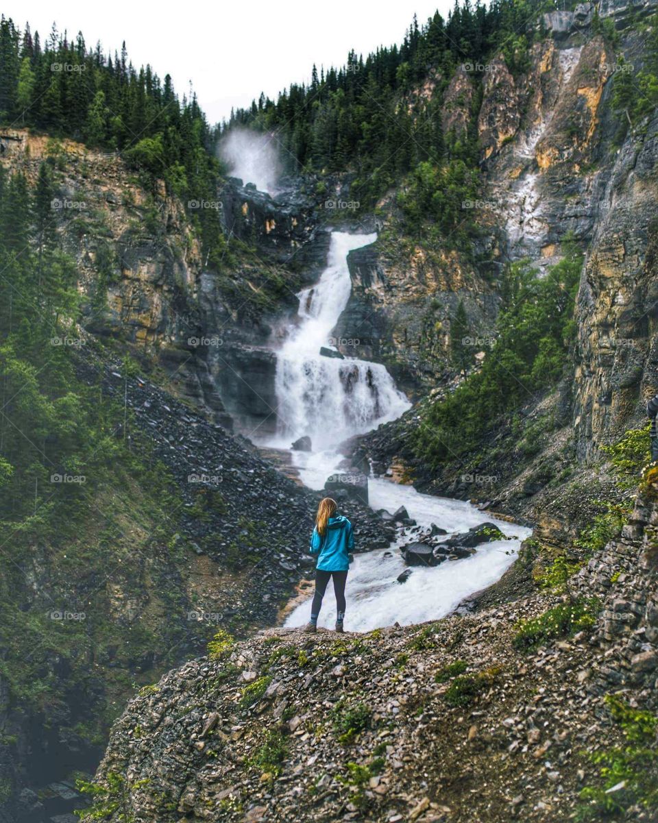 Watching a beautiful waterfall 