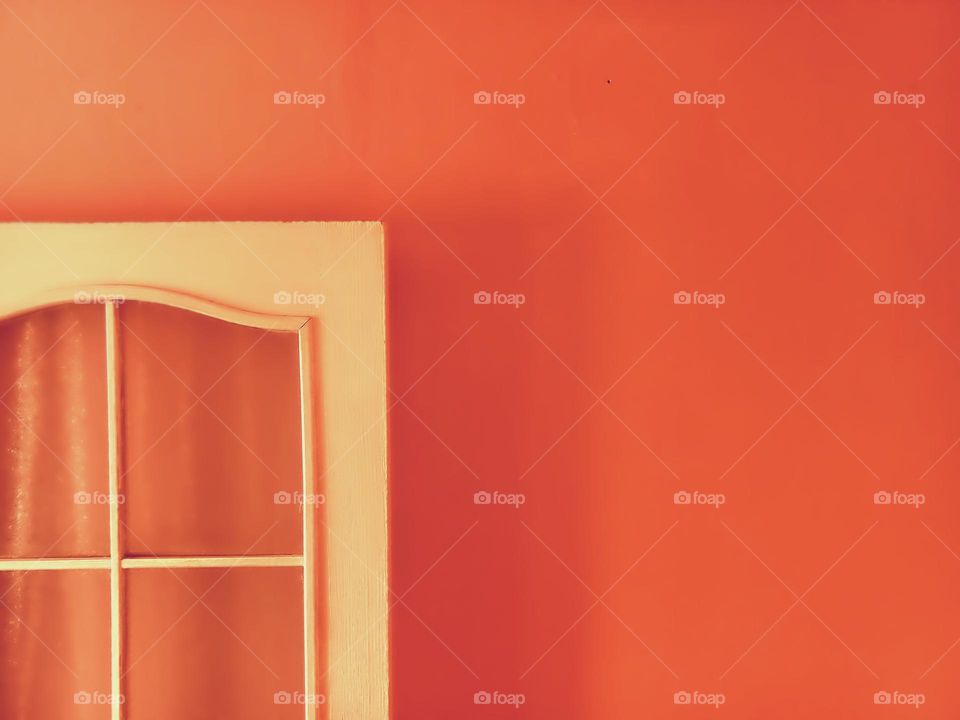 orange wall and door edge in minimalist style