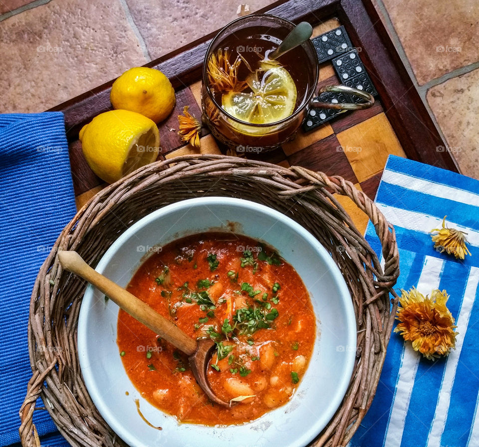 Beans with tomatoes and herbs plus some lemon tea