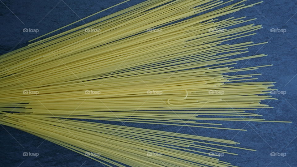 Uncooked spaghetti.