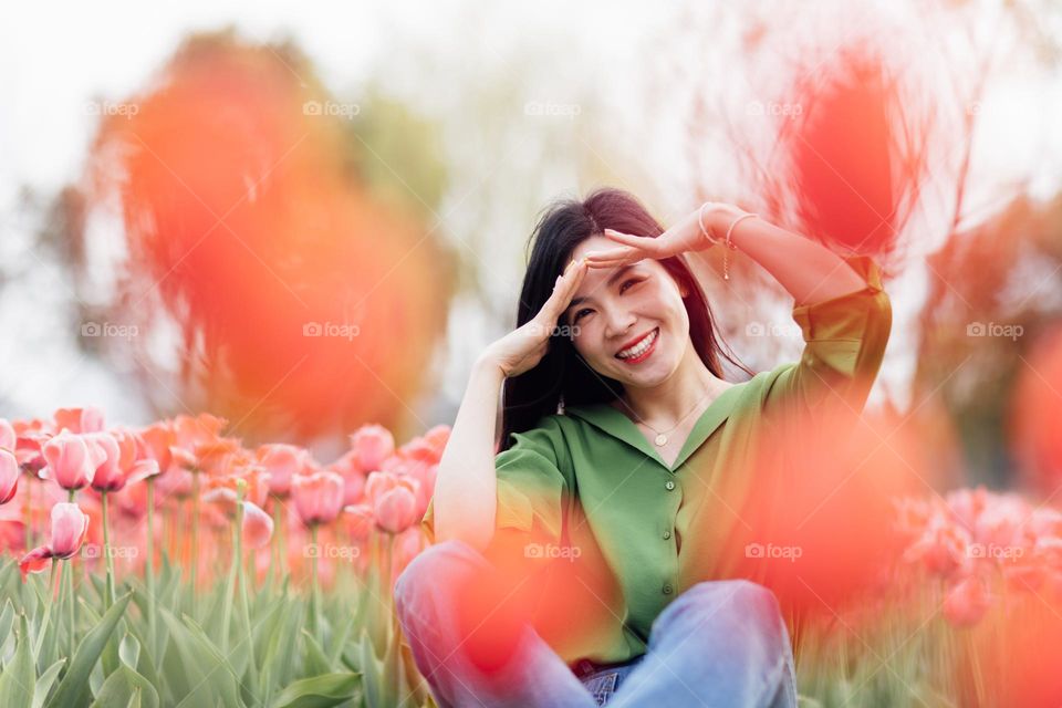 Candid lifestyle portrait of happy asian woman 