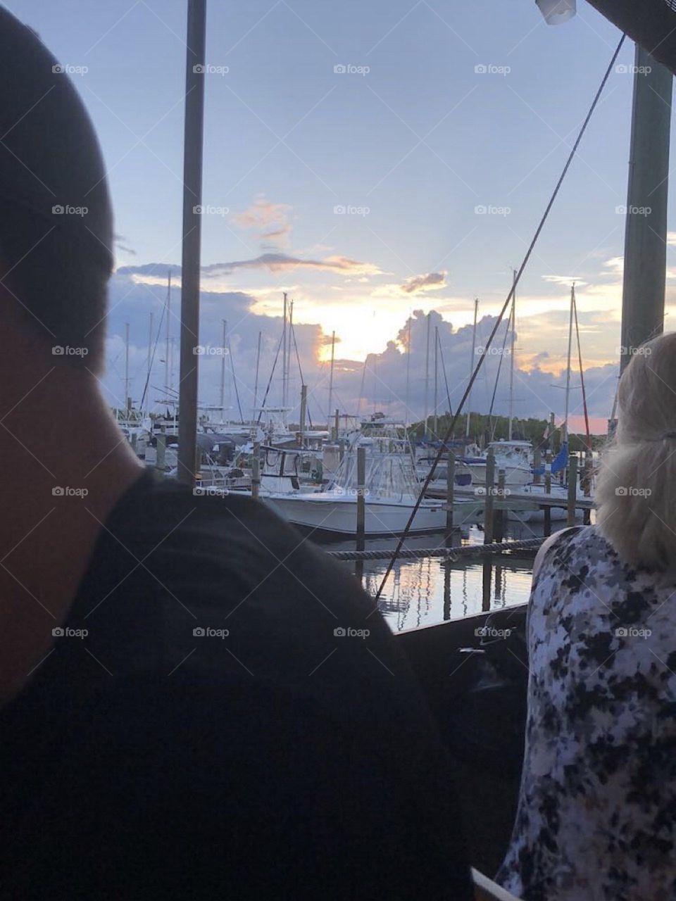 Sunsets always make the evening so much better. This sunset was in Florida on a pier. There were tons of boats and birds everywhere! The night was beautiful and the food was good at an amazing restuarant with an even better view!