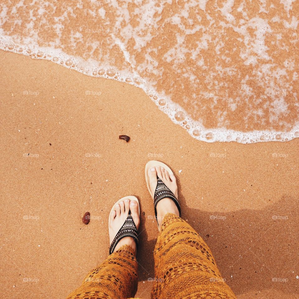 Woman standing on beach