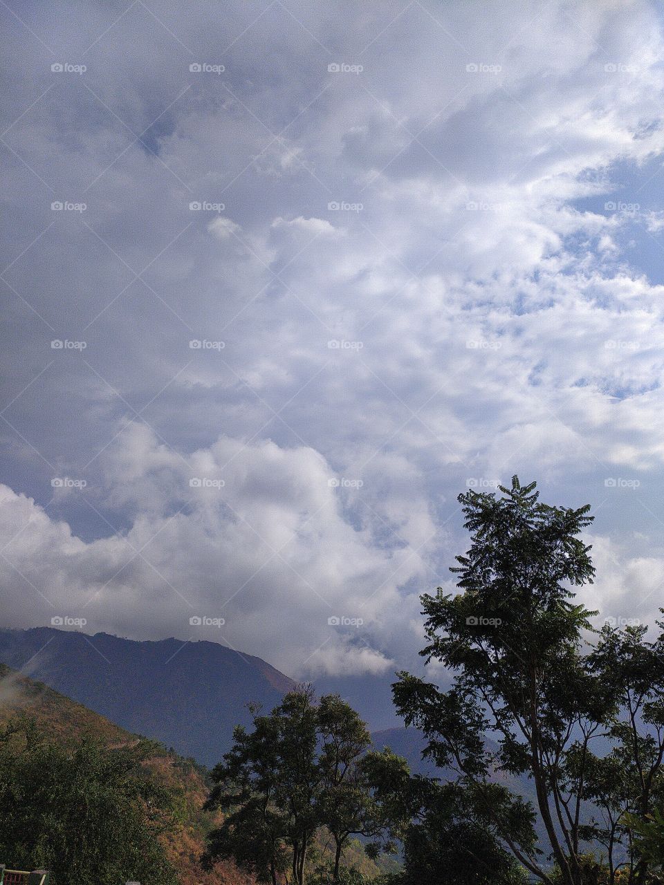 Hide and seek of clouds and sun