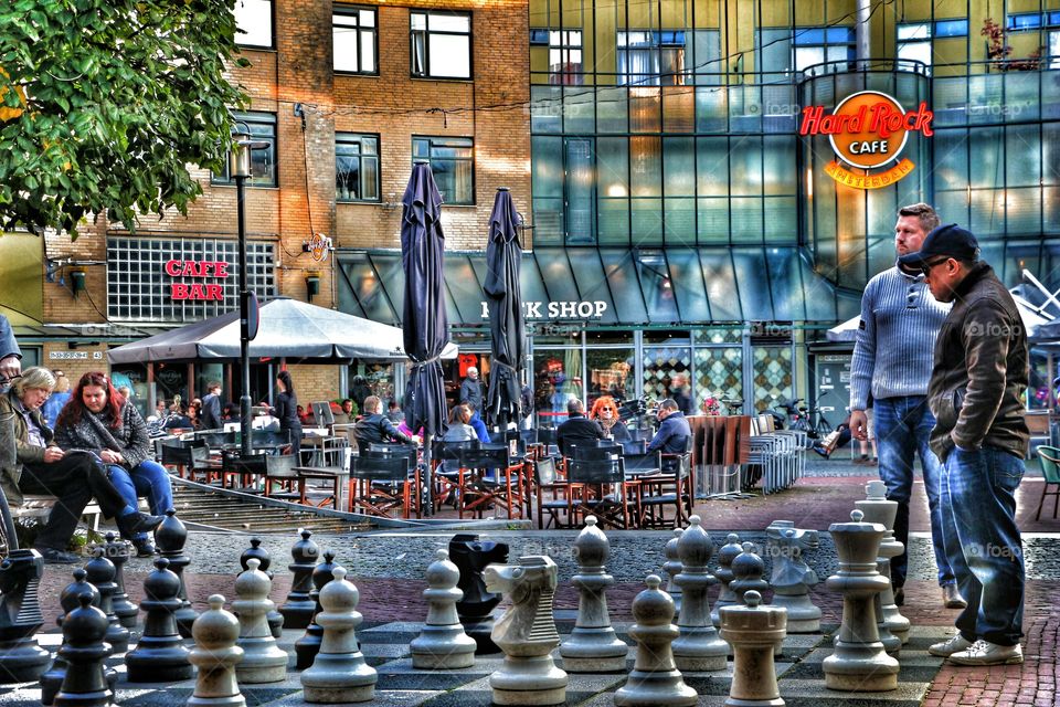 Chess pieces on street