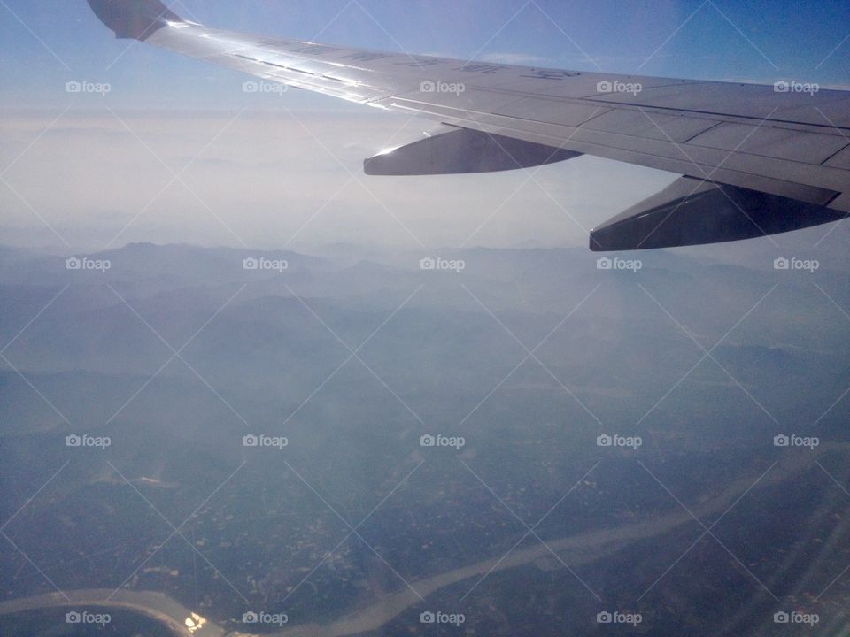 Mountains landscape view from the plane illuminator