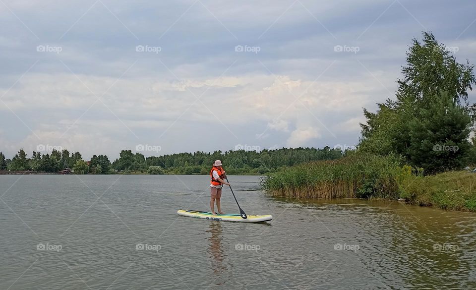 woman on a lake summer activities