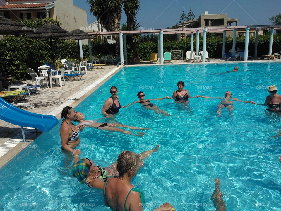 Early summer swimming  - aerobics time in swimming pool