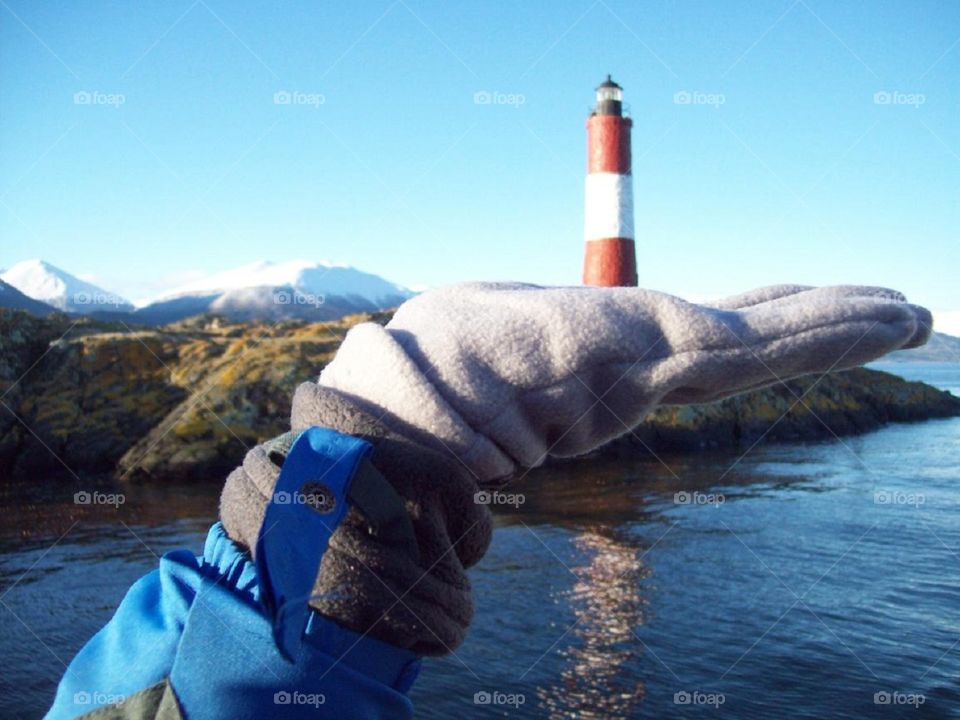 The lighthouse in the hand