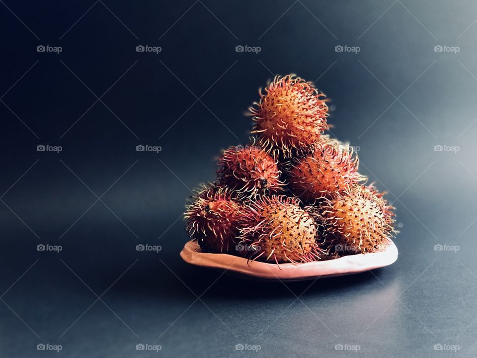Rambutan is a tropical fruit 