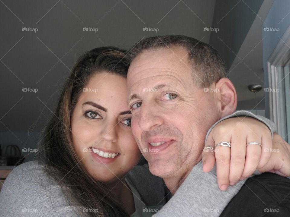 Daddy's girl. A sweet moment between father and daughter.