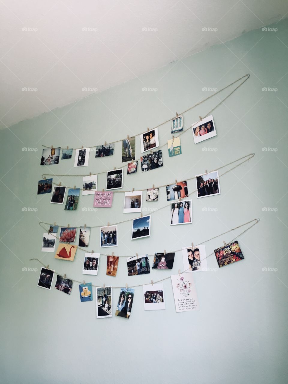 This is a simple photo of a wall in my bedroom that has different pictures hanging from little pins. Not only are there photos of random things- but there is also precious memories captured here of people who are dear to me. 