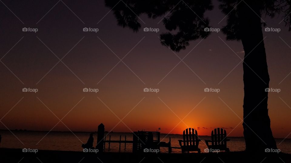 Beach chairs at sunset in Sarasota, Florida