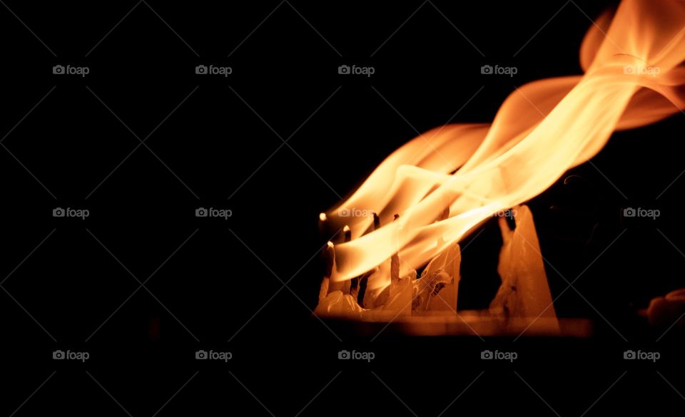 Beautiful candle flame are dancing in the night 