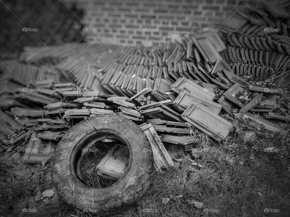 Old wheel and many tile