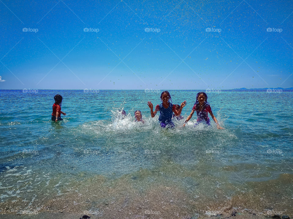 playing at the beach