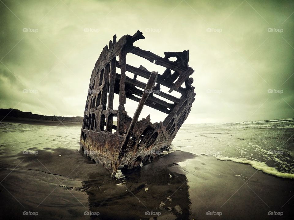 An old abandoned ship at beach