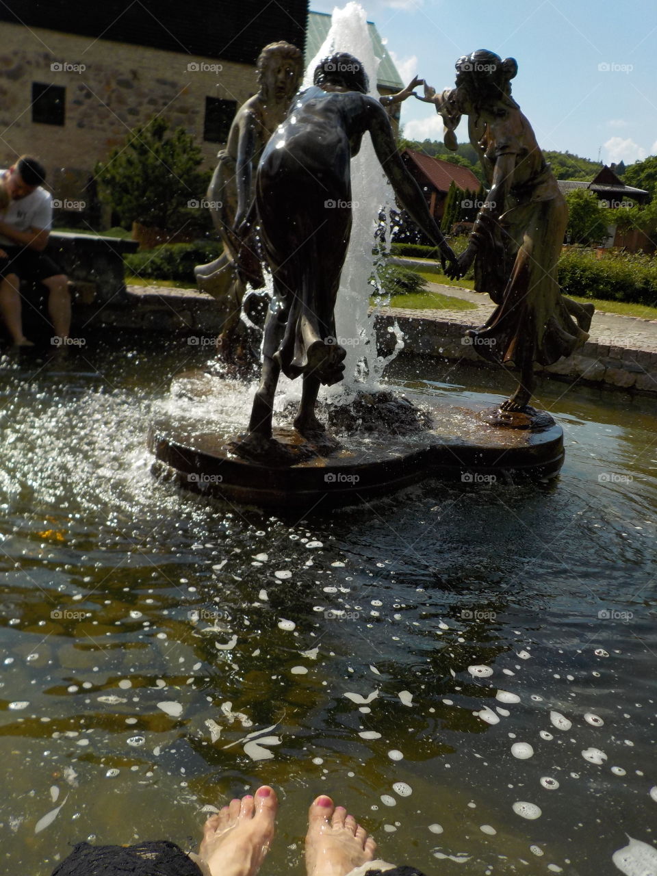 Statues round fountain in the park