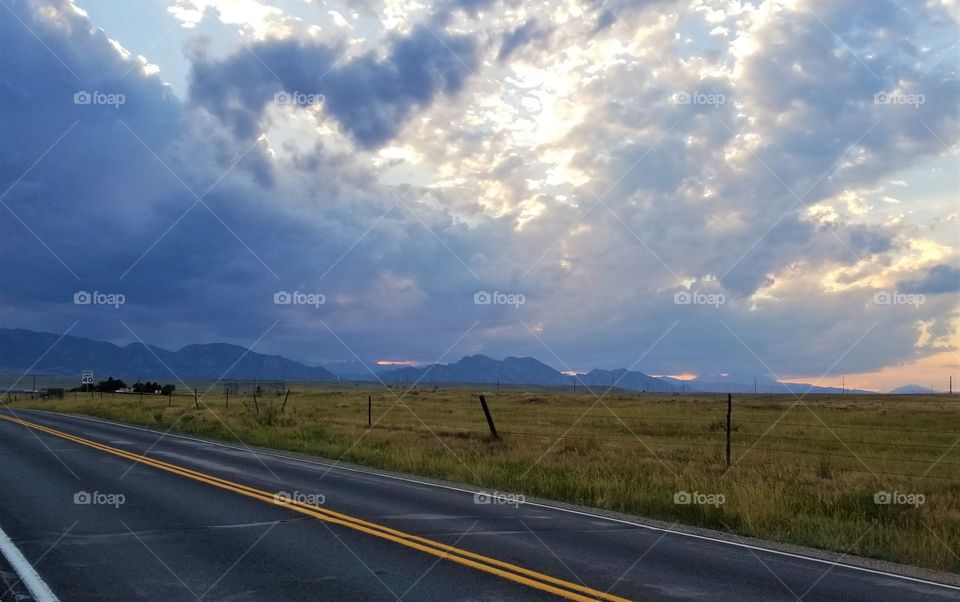 A summer storm rolls in over the foothills near Broomfield Colorado