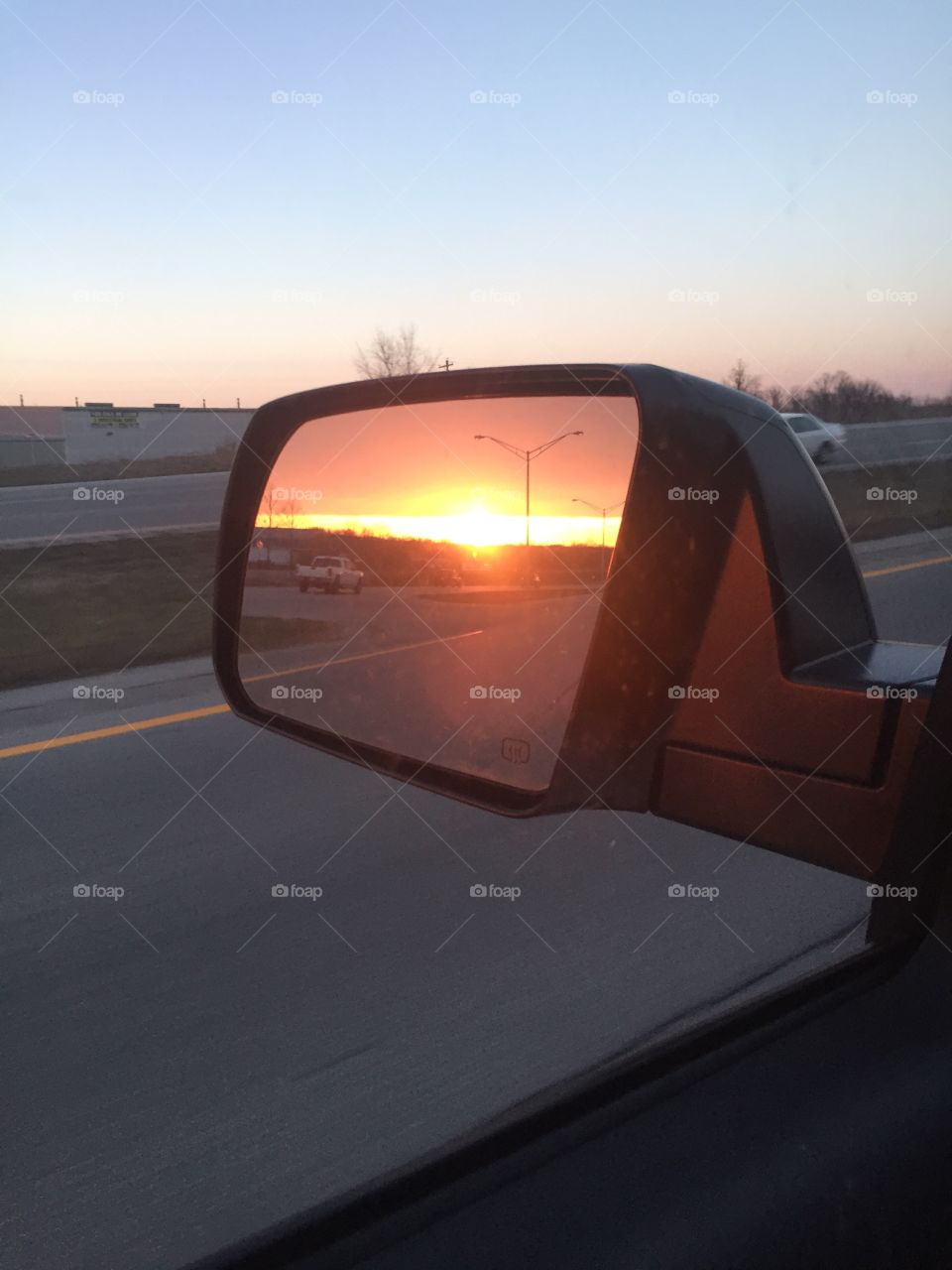 Sunset in the side mirror