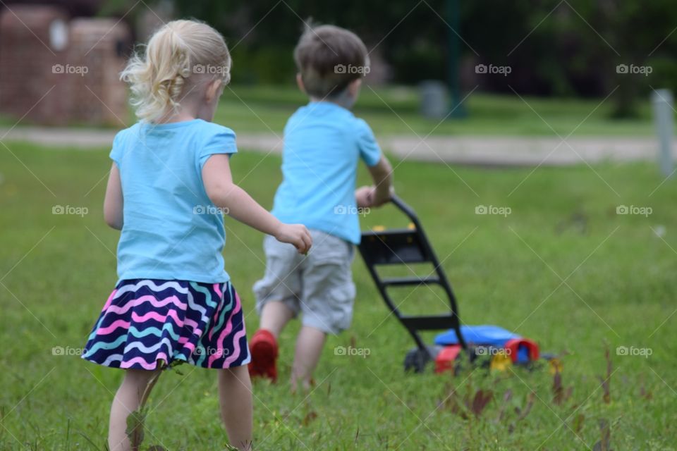 Mowing the yard. Hard at work