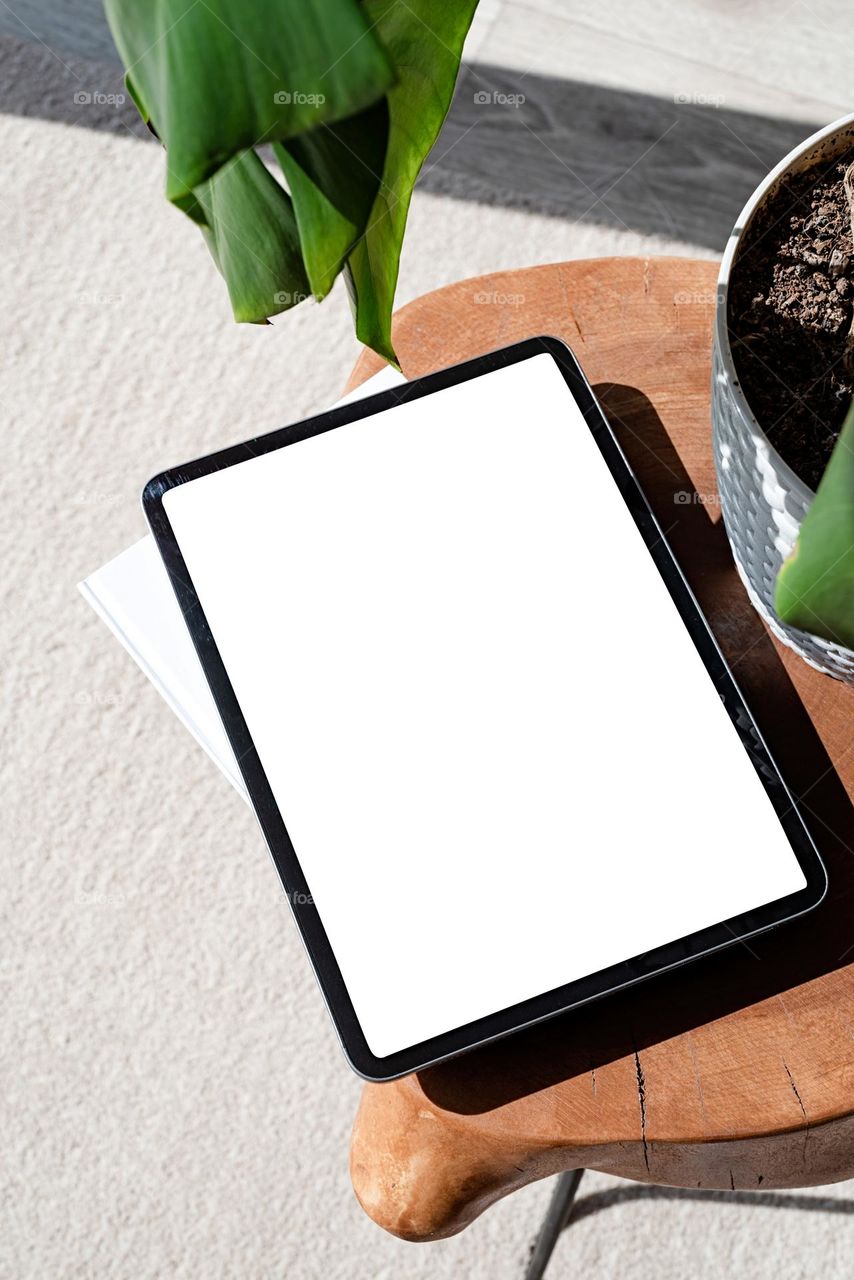 mockup tablet on wooden table