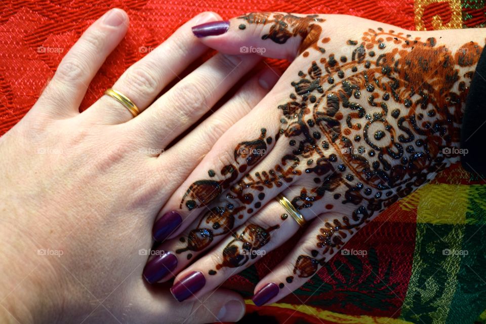 Joining hands with henna paiting, chefchaouen, Morroco