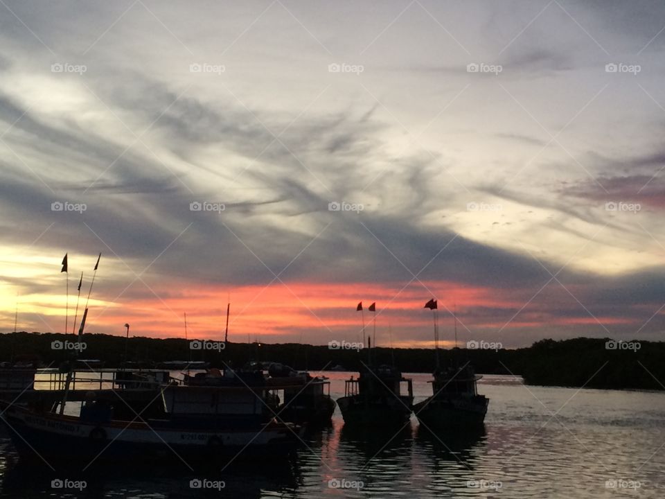 Boats and pink sky 