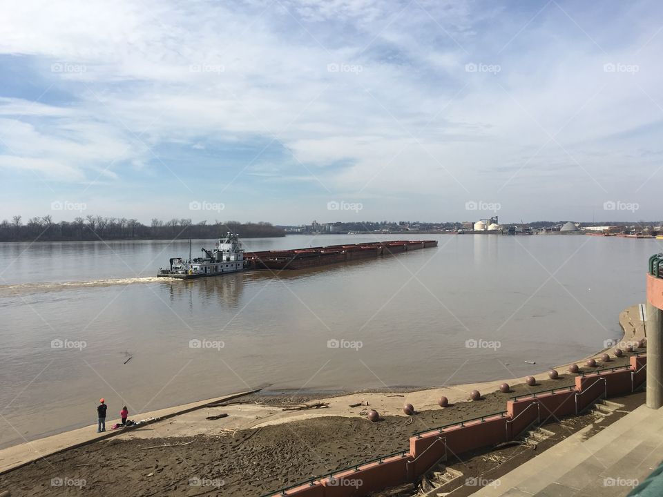 Barge being pushed down the Ohio river