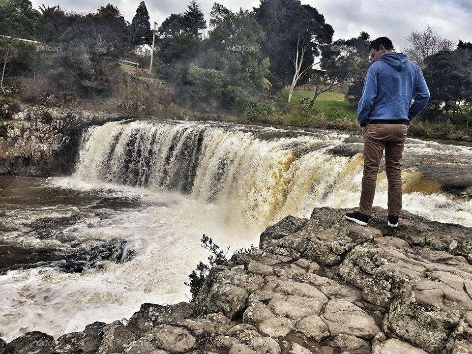 Standing at the Water Falls