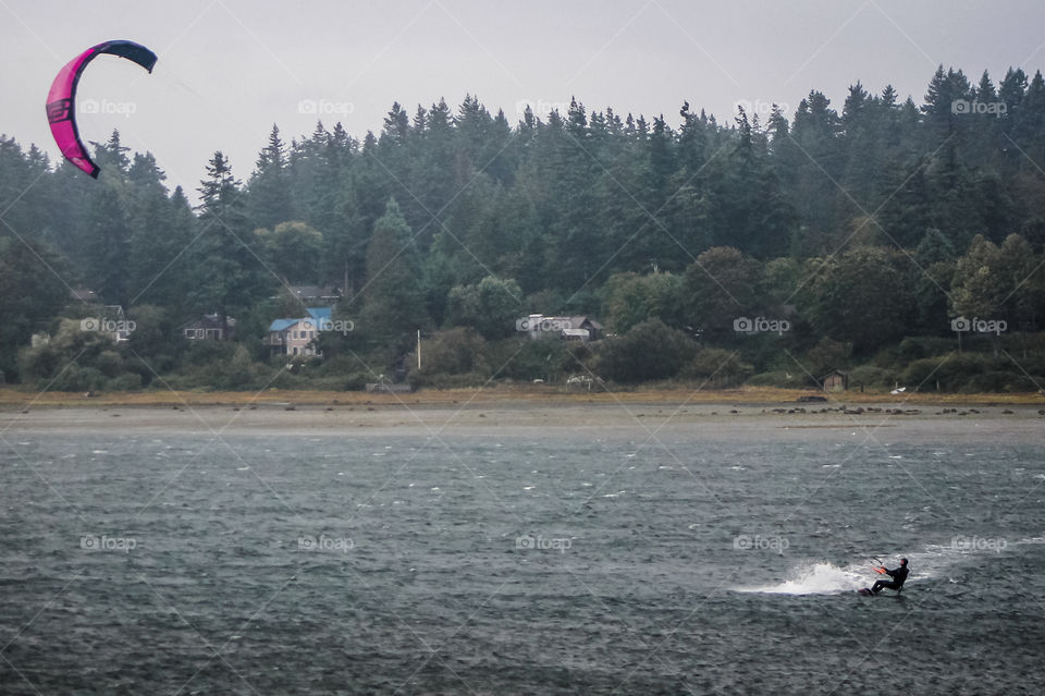 It is almost always windy on the Canadian Pacific Coast. This makes it perfect for kiteboarders! This boarder is whipping along the estuary sometimes going airborne when she catches a gust. Now that’s a great way to get from Point A to B! 💨